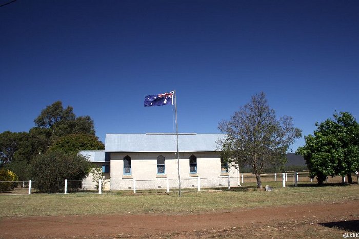 1 village: 1 church, 1 school house, 3 tennis courts, and 1 flag